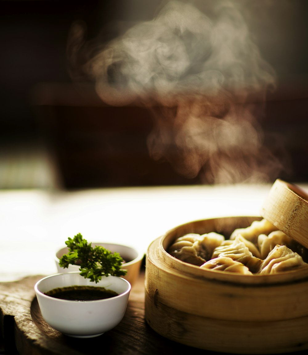 Steamed dumplings in a bamboo steamer